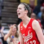 Indiana Fever guard Caitlin Clark (22) celebrates in the second half against the Dallas Wings at Gainbridge Fieldhouse.