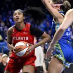 Atlanta Dream forward Angel Reese (5) pushes off Dallas Wings forward Alanna Smith (8) during the second half at College Park Center.