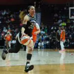 Las Vegas Aces guard Chennedy Carter (23) drives to the basket against the Connecticut Sun