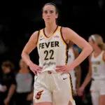 Indiana Fever guard Caitlin Clark (22) looks on in the second half against the Los Angeles Sparks at Crypto.com Arena.