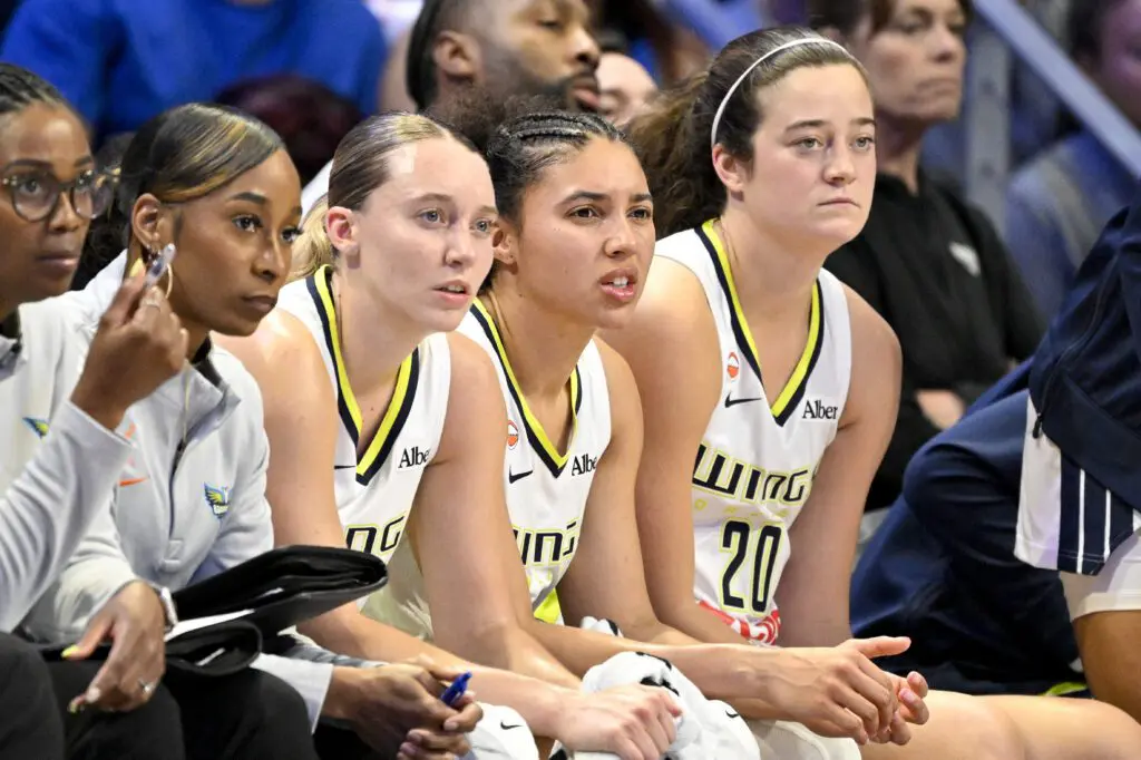 Dallas Wings guard Paige Bueckers (5) and guard Azzi Fudd (35) and forward Maddy Siegrist (20) look on from the bench during the second half against the Minnesota Lynx at College Park Center.