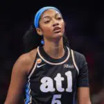 Atlanta Dream forward Angel Reese (5) comes out of a game against the Las Vegas Aces in the first quarter at State Farm Arena.
