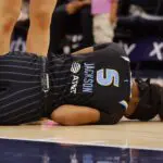 Chicago Sky forward Rickea Jackson (5) lays on the floor after an injury against the Minnesota Lynx in the second quarter at Target Center.
