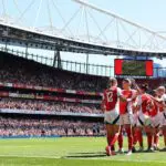 Frida Maanum of Arsenal celebrates with teammate Steph Catley after scoring her team's third goal during the Barclays Women's Super League match between Arsenal FC and Manchester United FC at Emirates Stadium on May 10, 2025 in London, England head of the WSL x Airbnb player housing deal.