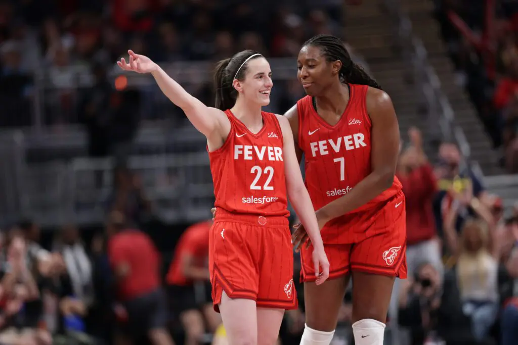Aliyah Boston #7 and Caitlin Clark #22 of the Indiana Fever looks on during the game against the Chicago Sky during a WNBA game on May 17, 2025 at Gainbridge Fieldhouse in Indianapolis, Indiana.