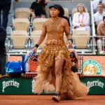 Naomi Osaka of Japan walks onto the court to play against Aryna Sabalenka in the fourth round on Day Nine of the 2026 French Open at Roland Garros.