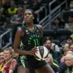 Awa Fam #11 of the Seattle Storm eyes a three-pointer during the third quarter against the Phoenix Mercury at Climate Pledge Arena on June 03, 2026 in Seattle, Washington.