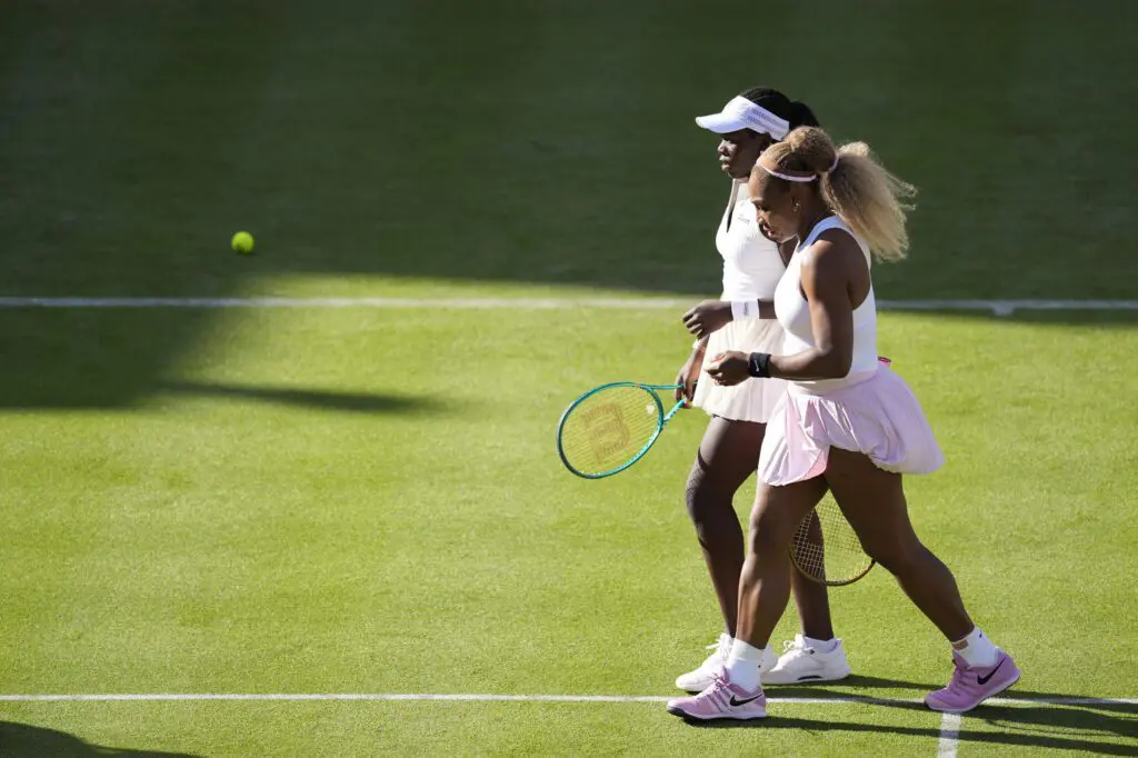 Serena Williams and Victoria Mboko compete during their round of 16 doubles match at The HSBC Championships 2026 women's tennis tournament at The Queen's Club in London, England