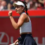 US player Iva Jovic celebrates winning a point against Philippines' Alexandra Eala during their round of 16, singles match at the HSBC WTA tennis Championships at Queen's Club in west London.