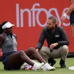 Canada's Victoria Mboko reacts after slipping on the grass attempting to play a return shot against Czech Republic's Karolina Pliskova during their round of 16 women's singles match at the HSBC WTA tennis Championships at Queen's Club.