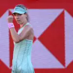 Katie Boulter of Great Britain celebrates a point against Elena Rybakina of Kazakhstan during the Women's Singles quarterfinal match on Day Five of the HSBC Championships at The Queen's Club.
