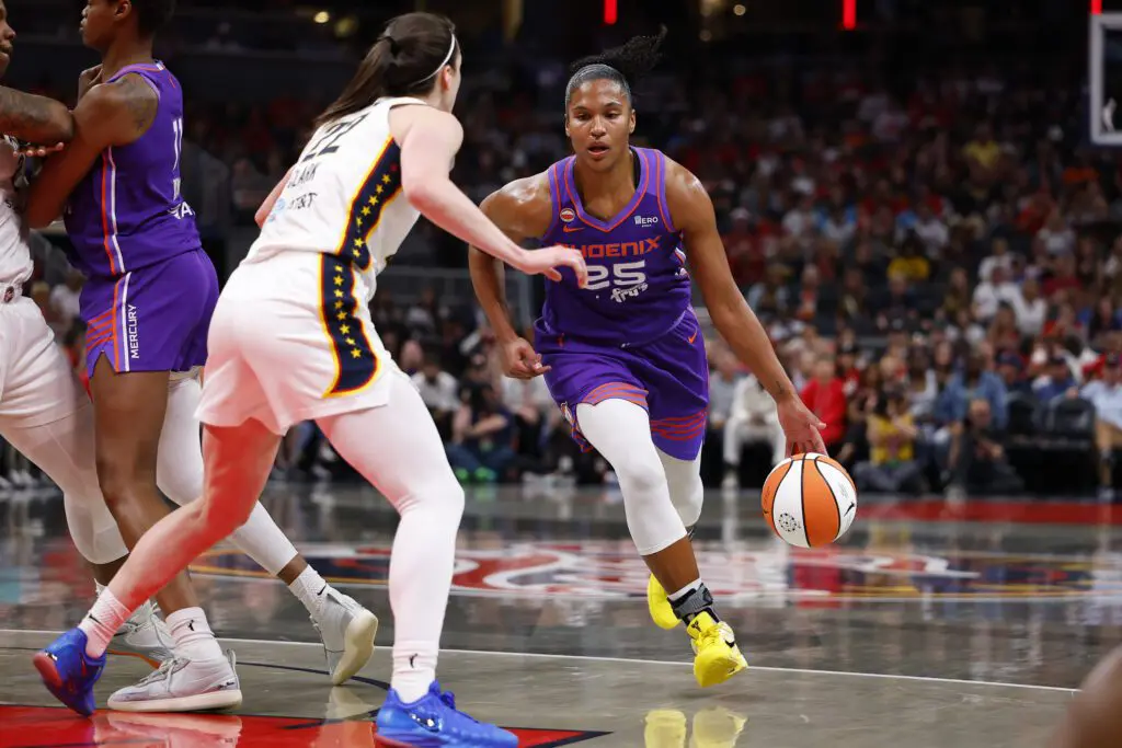 Phoenix Mercury forward Alyssa Thomas (25) drives towards the basket while defended by Indiana Fever guard Caitlin Clark (22) in the first half of play during a WNBA game between the Phoenix Mercury and the Indiana Fever on June 24, 2026 at Gainbridge Fieldhouse in Indianapolis.