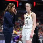 Caitlin Clark #22 of the Indiana Fever talks with Head Coach Stephanie White during the game against the Phoenix Mercury at Gainbridge Fieldhouse on June 24, 2026 in Indianapolis, Indiana ahead of Saturday's Fever vs Sparks game without star Kelsey Plum.