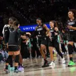 Kaila Charles #6, Veronica Burton #22, Kayla Thornton #5, Laeticia Amihere #3, Kaitlyn Chen #2, and Tiffany Hayes #15 of the Golden State Valkyries high five during the game against the New York Liberty on June 28, 2026 at Chase Center in San Francisco, California.