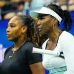 Serena Williams and Venus Williams of the USA play Lucie Hradecka and Linda Noskova of the Czech Republic in Woman's Doubles on day four of the 2022 U.S. Open tennis tournament at USTA Billie Jean King National Tennis Center.