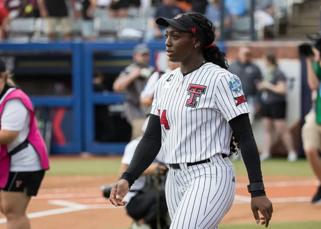 Texas Tech Red Raiders pitcher Nijaree Canady (24) walks onto the field during introductions before the game against the Mississippi State Bulldogs during the NCAA Women’s College World Series.