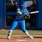 UCLA Bruins utility Megan Grant (43) is hit by a pitch in the first inning against the Texas Tech Red Raiders during the NCAA Women’s College World Series at Devon Park ahead of her AUSL debut on the Portland Cascade roster.