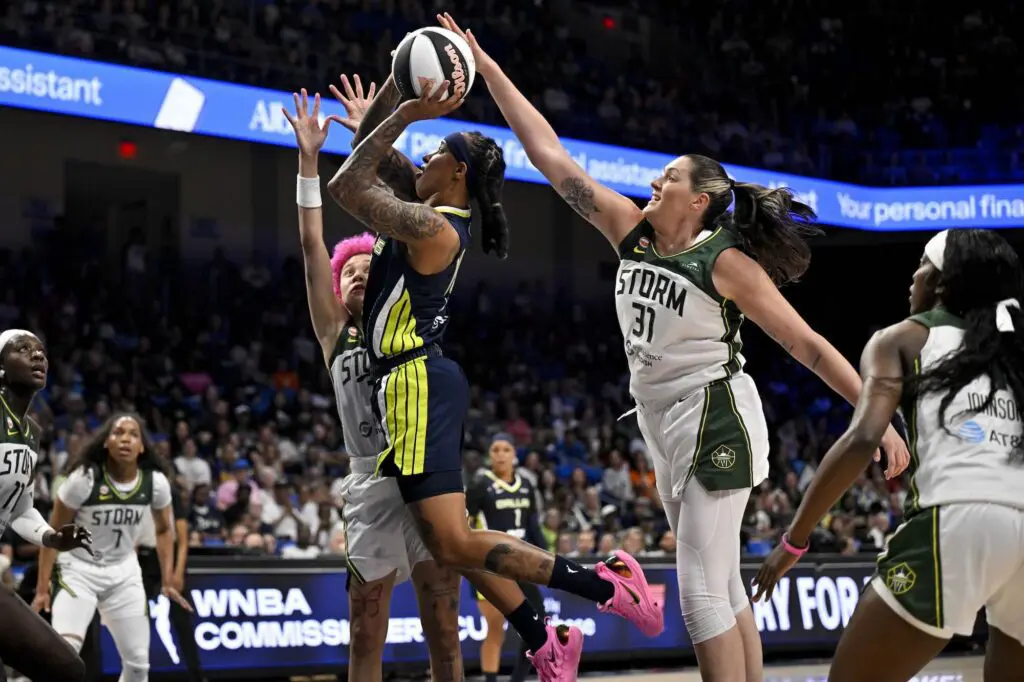 Seattle Storm center Stefanie Dolson (31) blocks a shot by Dallas Wings guard Aziaha James (10) during the second half at College Park Center during the 2026 WNBA Commissioner's Cup.