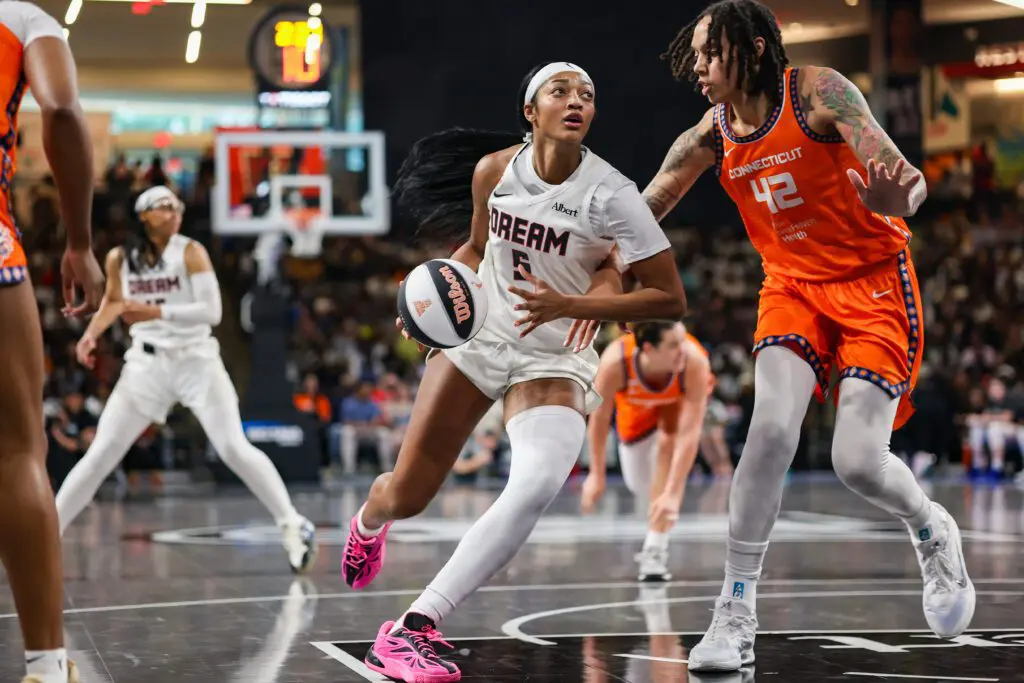 Atlanta Dream forward Angel Reese (5) drives on Connecticut Sun center Brittney Griner (42) in the second quarter at Gateway Center Arena.