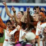 Texas Longhorns pitcher Teagan Kavan (17) celebrates with teammates after Game 1 of the NCAA softball Women's College World Series finals between the Texas Longhorns and the Texas Tech Red Raiders at Devon Park in Oklahoma City, Wednesday, June 3, 2026.