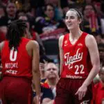 Indiana Fever guard Caitlin Clark (22) looks on in the second half against the Atlanta Dream at Gainbridge Fieldhouse at the Fever vs Dream WNBA Commissioner's Cup game.