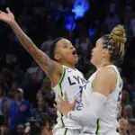 Minnesota Lynx guards Courtney Williams (10) and Kayla McBride (21) celebrate after defeating the Golden State Valkyries at Target Center.