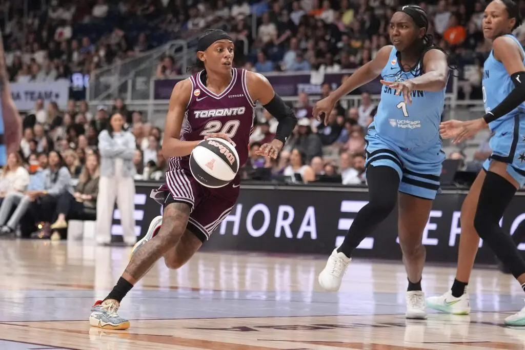 Toronto Tempo guard Brittney Sykes (20) drives to the basket against Chicago Sky forward Elizabeth Williams (1) during the first half at Coca-Cola Coliseum.