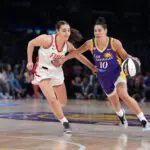 LA Sparks guard Kelsey Plum (10) dribbles against Portland Fire guard Carla Leite (0) in the second half at Crypto.com Arena.