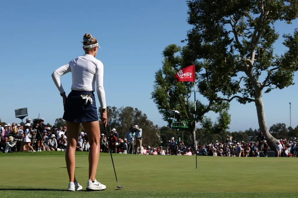 Nelly Korda stands on the 18th green during the final round of the U.S. Women's Open golf tournament at Riviera Country Club, topping the LPGA leaderboard ahead of the 2026 KPMG Women's PGA Championship.