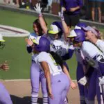 Aminah Vega of the Texas Volts celebrates as she comes home after hitting a home run during an AUSL softball game between the Oklahoma City Spark and the Texas Volts at Oklahoma Christian University.