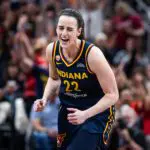 Indiana Fever guard Caitlin Clark (22) celebrates a made basket in the first half against the Chicago Sky at Gainbridge Fieldhouse.