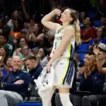 Dallas Wings guard Paige Bueckers (5) celebrates after a play against the Phoenix Mercury during the second half at College Park Center.