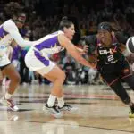 Phoenix Mercury guard-forward Kahleah Copper (2) drives past Los Angeles Sparks guard Kelsey Plum (10) and guard Ariel Atkins (7) in the second half at Mortgage Matchup Center.