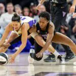 Los Angeles Sparks guard Kelsey Plum (10) and Golden State Valkyries guard-forward Kaila Charles (6) fight for the ball during the fourth quarter in a Commissioner’s Cup game at Chase Center.