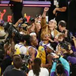 LA Sparks forward Nneka Ogwumike (30) celebrates game winning buzzer beating three point shot with teammates against the New York Liberty at Crypto.com Arena during the liberty vs sparks game.
