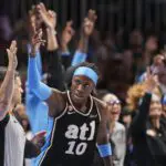 Atlanta Dream guard Rhyne Howard (10) reacts with the fans after making a three point shot against the Toronto Tempo during the second half at State Farm Arena.