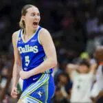 Dallas Wings guard Paige Bueckers (5) reacts after shooting a three-pointer against the Seattle Storm dduring the fourth quarter at Climate Pledge Arena.