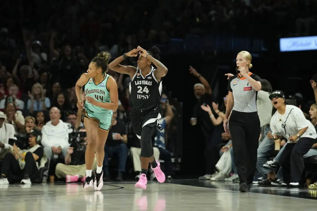 Las Vegas Aces guard Jewell Loyd (24) celebrates after scoring against the New York Liberty during the third quarter of a WNBA basketball game at Michelob Ultra Arena ahead of the 2026 WNBA Commissioner's Cup.