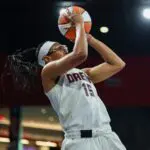 Atlanta Dream guard Allisha Gray (15) shoots against the Portland Fire in the first quarter at Gateway Center Arena at College Park ahead of the Dream vs Wings clash.