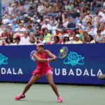 Naomi Osaka (JPN) hits a backhand against Ashlyn Krueger (USA) (not pictured) on day three of the 2026 Mubadala DC Open.