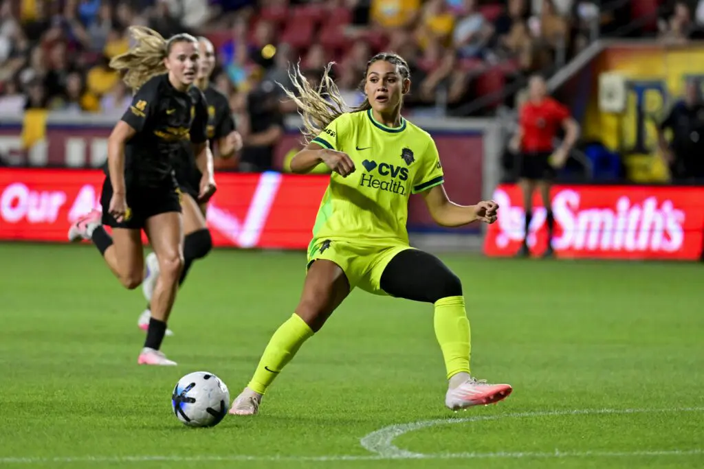 Washington Spirit forward Trinity Rodman (2) makes a pass around Utah Royals midfielder Ana Tejada (17) during the first half at America First Field.