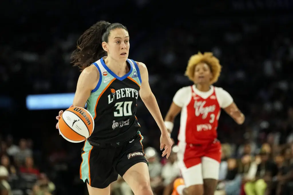New York Liberty forward Breanna Stewart (30) dribbles the ball against the Las Vegas Aces during the fourth quarter of a WNBA basketball game at Michelob Ultra Arena.