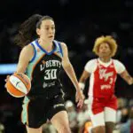New York Liberty forward Breanna Stewart (30) dribbles the ball against the Las Vegas Aces during the fourth quarter of a WNBA basketball game at Michelob Ultra Arena.