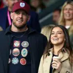 Burnley minority share holders JJ Watt and Kealia Watt applaud from the stands during the Sky Bet Championship match at Turf Moor, Burnley.