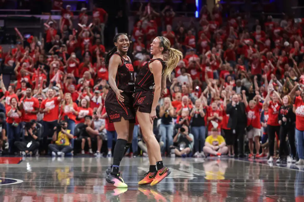 Aliyah Boston #7 and Lexie Hull #10 of the Indiana Fever celebrate during the second half against the Atlanta Dream.