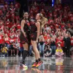 Aliyah Boston #7 and Lexie Hull #10 of the Indiana Fever celebrate during the second half against the Atlanta Dream.