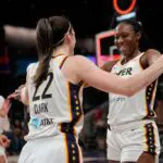 Caitlin Clark #22 of the Indiana Fever celebrates with Aliyah Boston #7 after scoring the game-winning three pointer during the second half against the Washington Mystics at CareFirst Arena on June 08, 2026 in Washington, DC.