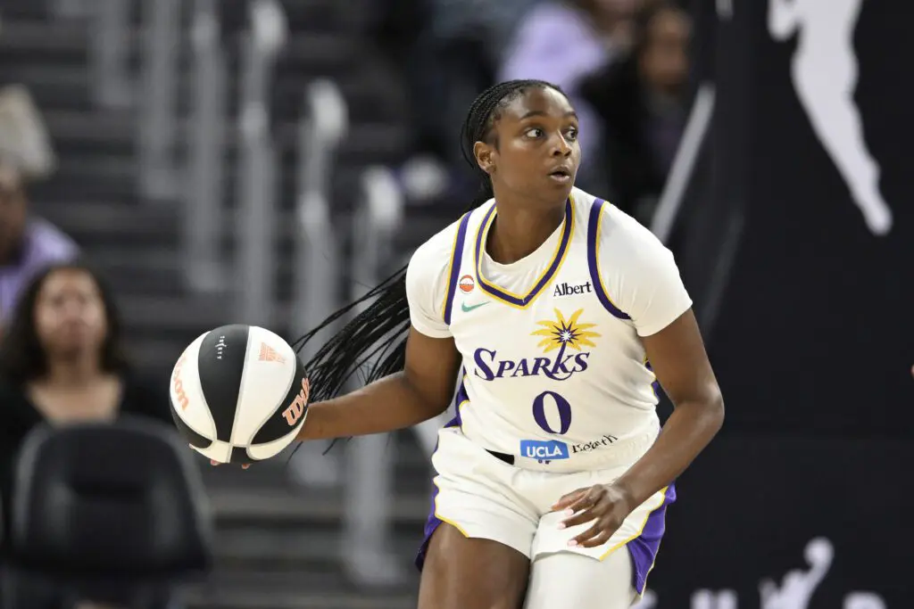 Ta'Niya Latson #0 of the Los Angeles Sparks dribbles against the Golden State Valkyries in the fourth quarter during a Commissioner's Cup game at Chase Center.