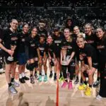The New York Liberty pose for a photo after winning the 2026 WNBA Commissioner's Cup Game against the Las Vegas Aces.