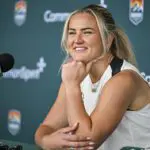 Denver Summit FC player Lindsey Heaps speaks to members of the media after practice at the team's headquarters in Centennial, Colorado.